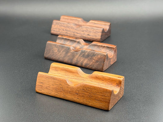 CAPTION: Pen rest shown in walnut, figured walnut, and mahogany