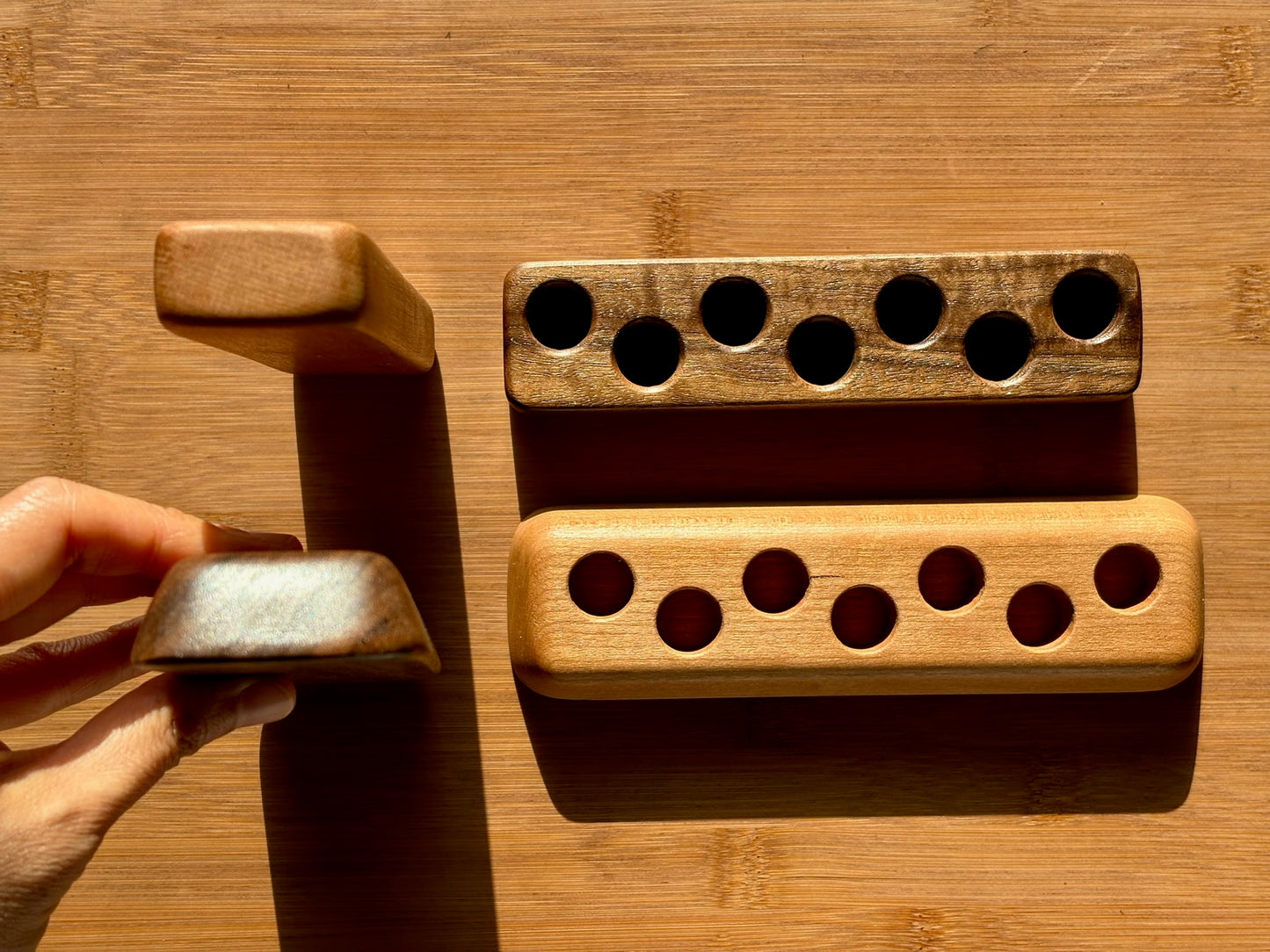 Wooden ink sample vial holders in straight and flared base designs, walnut and maple