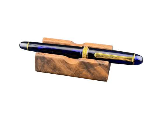 CAPTION: Pen rest shown in figured walnut